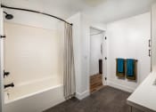 Thumbnail 17 of 48 - a bathroom with a shower and a sink at VORA LUX, San Diego