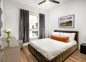 Thumbnail 13 of 48 - a bedroom with a bed and a window at VORA LUX, San Diego, CA