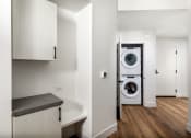 Thumbnail 45 of 48 - a washer and dryer in a small apartment at VORA LUX, San Diego, CA 92120