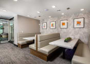 Thumbnail 29 of 48 - a seating area with couches and a table at VORA LUX, California, 92120
