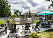 Thumbnail 17 of 19 - our apartments have an outdoor patio with a grill and table