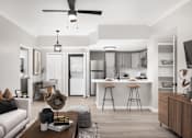 Thumbnail 2 of 37 - A modern kitchen with white appliances and a dining area with a white couch and a coffee table.