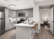 Thumbnail 1 of 37 - A modern kitchen with a white island and stools.
