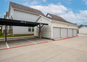 Thumbnail 18 of 28 - the estates with parking lot and garages