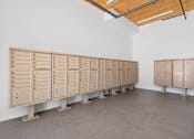 Thumbnail 21 of 22 - A row of lockers are lined up in a room.