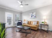 Thumbnail 10 of 44 - Living room area with seating