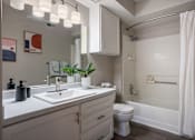 Thumbnail 15 of 44 - A Bathroom With a Sink at Odyssey Apartments, Albuquerque, NM, 87114