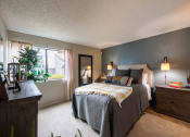 Thumbnail 6 of 56 - a bedroom with a bed and a window