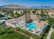 Thumbnail 11 of 17 - Clubhouse with pool  at Monarch Meadows, Utah, 84096