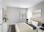 Thumbnail 4 of 22 - A bedroom with a large bed and a window with blinds.
