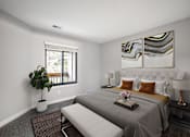 Thumbnail 9 of 22 - A bedroom with a large bed and a potted plant.