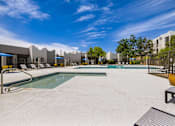 Thumbnail 23 of 44 - Outdoor Swimming Pool at Odyssey Apartments, Albuquerque, NM, 87114