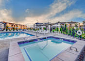 Thumbnail 27 of 34 - Resort Inspired Pool and Spa with Seating