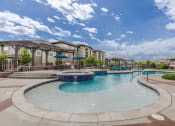 Thumbnail 5 of 41 - the preserve at ballantyne commons pool and amenities with apartment buildings