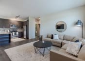 Thumbnail 3 of 41 - a living room with a couch and a coffee table