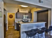 Thumbnail 4 of 27 - kitchen and barstools at Solitude at Centennial, Nevada