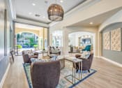 Thumbnail 16 of 33 - Clubhouse with couch  at Stone Canyon Apartments, Riverside, California