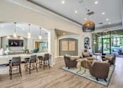 Thumbnail 18 of 33 - Clubhouse interior area  at Stone Canyon Apartments, California