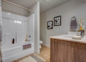 Thumbnail 9 of 27 - Model bathroom