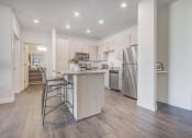 Thumbnail 3 of 47 - Kitchen- Stainless Steel Appliances, Hardwood floor, counter height island