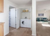 Thumbnail 5 of 17 - apartment hallway and washer/dryer