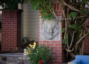 Thumbnail 33 of 44 - entrance with lion head at Lionsgate South, Hillsboro, Oregon