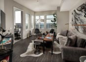 Thumbnail 1 of 30 - Model Living Room at AV8 Apartments in San Diego, CA
