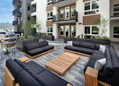 Thumbnail 38 of 42 - Outdoor courtyard with couches.
