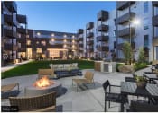 Thumbnail 5 of 26 - Night view of firepits and grills