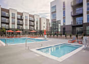 Thumbnail 23 of 35 - Outdoor pool and hot tub with lounge seating