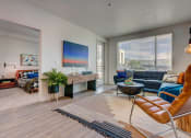 Thumbnail 6 of 35 - Model apartment home living room and bedroom