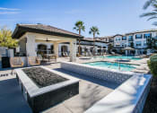 Thumbnail 38 of 54 - Fireplace by pool
