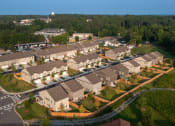 Thumbnail 26 of 60 - an aerial view of a neighborhood of houses
