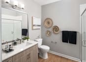 Thumbnail 7 of 45 - Bathroom with mirror and sink at Alta Davis, Durham, North Carolina