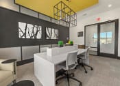 Thumbnail 24 of 38 - a conference room with a white desk and chairs