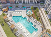 Thumbnail 24 of 35 - an aerial view of a swimming pool in an apartment building