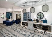 Thumbnail 34 of 41 - a large lobby with a reception desk and chairs