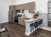 Thumbnail 3 of 41 - a kitchen with a counter top and
