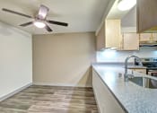 Thumbnail 38 of 44 - the preserve at ballantyne commons apartment kitchen and ceiling fan
