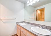 Thumbnail 44 of 44 - the ensuite bathroom has dual sinks and a large mirror