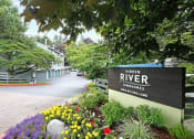 Thumbnail 1 of 30 - a sign for hidalgo river townships with flowers and trees
