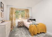 Thumbnail 19 of 27 - a bedroom with a bed and a window with a yellow curtain