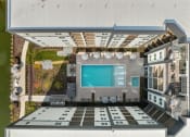Thumbnail 5 of 27 - an aerial view of a swimming pool on the roof of a house