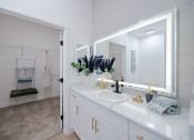 Thumbnail 3 of 59 - a bathroom with a sink and a mirrorat Element 12 Apartments, Henderson NV
