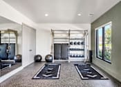 Thumbnail 6 of 30 - Modern fitness center with cardio and strength equipment at The Charles