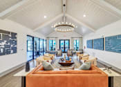 Thumbnail 8 of 30 - Elegant resident lounge with comfortable seating and modern coastal-inspired décor