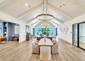 Thumbnail 10 of 30 - Elegant resident lounge with comfortable seating and modern coastal-inspired décor