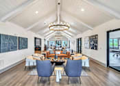 Thumbnail 11 of 30 - Elegant resident lounge with comfortable seating and modern coastal-inspired décor