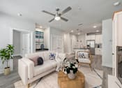 Thumbnail 13 of 30 - Bright apartment living room with large windows and contemporary furnishings