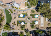 Thumbnail 55 of 63 - A large white building with a green lawn in front of it.